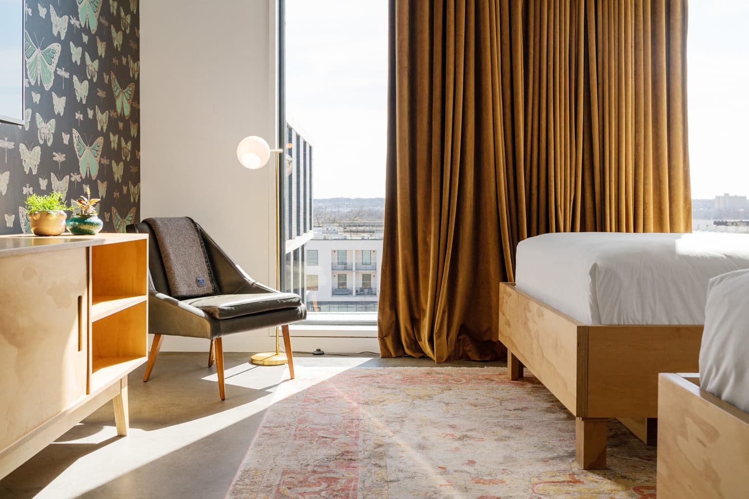 view of room out a window to the Austin skyline